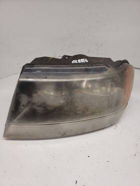55155129ag Jeep Driver Headlight Smoke Tint Dark Background Fits 02-04 Grand Cherokee 1199492