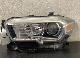 60653 Toyota -60653 2016-2021 Tacoma Halogen Left Headlight Used Oem