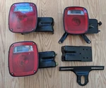 Lot Of 3, Tail Light Housing & Mount Ford 9070 D.o.t Sae Ailrst 79, EOHTI34O5AA. Fixed Price $55.00.