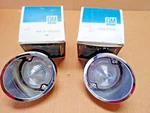 63-66 Corvette Nos Original Back Up Light Assemblies, Lh 910427 & Rh 910428. Fixed Price $395.00.