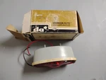 New Old Stock Dominion Auto Red Tail Light Marker 70-2000. Fixed Price $9.99.