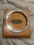 Nos Ford D1UZ-13064-A 1971-74 Econoline Van Headlight Bezel. Fixed Price $50.00.