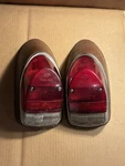 Hella Vw Bug Beetle Tail Lights W/ Metal Housing MSRBBL365 Zr. Fixed Price $112.45.