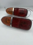 Triumph TR5 And Aston Martin,original Lucas Rear Lamp Lenses, Housing L799.. Fixed Price $299.99.