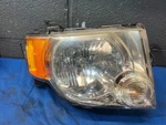 2008-2012 Ford Escape 2.5L,FWD Passenger Side Headlight 8L84-13005-A. Fixed Price $49.00.
