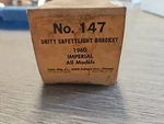Nos Unity 147 Lh Spotlight Mounting Bracket For 1960 Imperial All Models. Fixed Price $80.00.