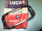 Original Lucas TR6 Side Marker Bezel. Fixed Price $25.00.