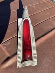 1956 Plymouth Savoy Belvedere Tail Light Assembly Lens Painted Housing Oem. Fixed Price $135.00.