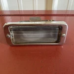 1942 Oldsmobile Parking Light Original. Fixed Price $39.99.