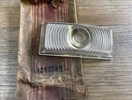 1949 Plymouth P17 P18 Nos Mopar Park Light Lens 1297789. Fixed Price $65.00.
