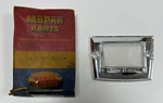New Old Stock License Lamp Bezel For 1949-1953 Models Mopar #1473177. Fixed Price $100.00.