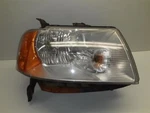 Passenger Right Headlight Fits 05-07 Freestyle 333205. Fixed Price $80.00.