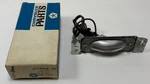 New Old Stock License Lamp For 1965-71 Plymouth Dodge Models Mopar #3479400. Fixed Price $235.00.