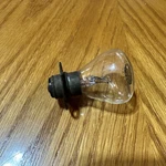Vintage Mazda 6-8 Volt Headlight Bulb 2221 Prefocused Lamp. Fixed Price $12.95.