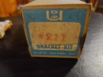 Nos Unity 211 Lh Spotlight Mounting Bracket For 1971 Chevy/b/o/p Station Wagon. Fixed Price $75.00.