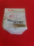 Nos Cadillac # 31 Unity Spotlight Bracket & Hardware Box 604. Fixed Price $175.00.