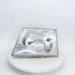 Aftermarket Left Head Lamp Part Number 114-00206L 1995 Ford 150. Fixed Price $36.99.