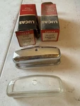 Nos Lucas Cover 572603 Lens 54570354 License Plate Light. Fixed Price $52.00.