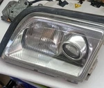 Mercedes Benz Original Left Xenon Headlamp R129 1298208761 Assembly Complete Sl. Fixed Price $950.00.