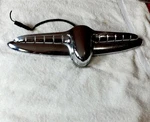 1950-1951-1952 Plymouth Trunk Ornament Emblem License Plate Light Genuine #110. Fixed Price $570.00.