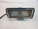 1963 Oldsmobile Guide Back Up Light Bezel. Fixed Price $60.00.