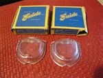 Nos 1951-1952 Oldsmobile License Lamp Lens Set, In Boxes, 5939897. Fixed Price $29.49.