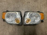 2008-2012 Ford Escape Headlights Pair Passenger Right & Driver Left 08-12 Oem. Fixed Price $161.99.