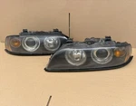 Bmw E39 Halogen Headlights Left Right Pair Sedan Touring Genuine Oem. Fixed Price $420.00.