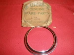 Lucas Oem, Nos Tail Light Chrome Ring... Part # 572734. Fixed Price $25.00.