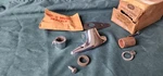 Nos 1952 Ford Lh Spotlight Bracket Kit FAA-18155-A. Fixed Price $30.00.