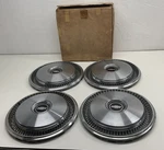 (4) Nos Gm 1973-75 Camaro Chevelle Nova 14"HUBCAPS 3997992 O3. Fixed Price $125.95.