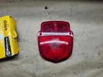 1948-66 F-series Flareside Truck; Shield Tail Lamp Lens; Red Ford Block. Fixed Price $14.00.