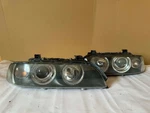 Bmw E39 Halogen Headlights Left Right Pair Sedan Touring Genuine Oem. Fixed Price $550.00.