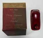New Old Stock Tail Lens For 1941 Plymouth Models Mopar #902136. Fixed Price $85.00.