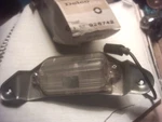62 63 64 65 Nova Chevy Nos License Lamp 926742 Original Gm. Fixed Price $125.00.