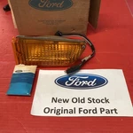 New Old Stock Ford Mustang 1971-1972 Left Park Light Assembly D1ZZ-13201-A. Fixed Price $125.00.