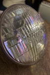 Vintage Sealed Beam Headlight Bulb 5-3/4" Round Glass Lens Made Usa. Fixed Price $25.00.