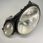 Oem 2003-2006 Mercedes E-class E350 Left Driver Side Headlight Lamp 15435900. Fixed Price $105.00.