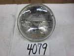 7" Round Sylvania Halogen #6014 Headlamp Bulb New. Fixed Price $15.00.