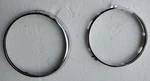 Classic Lucas Headlight Rims Outer 54520650 & Inner 54521913 Oem. Fixed Price $48.00.