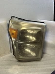 Passenger Headlight Composite Fits 11-16 Ford F250SD Pickup 11404. Fixed Price $80.00.