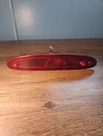 03-07 Chrysler Town & Country Caravan Third Brake Light Center Mount 04857214AB. Fixed Price $29.99.