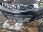 Front Bumper Without Fog Lamps Fits 07-09 Mazda CX-7 432308. Fixed Price $546.00.