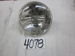 Sylvania #6014 7" Round Headlamp Bulb. Fixed Price $15.00.